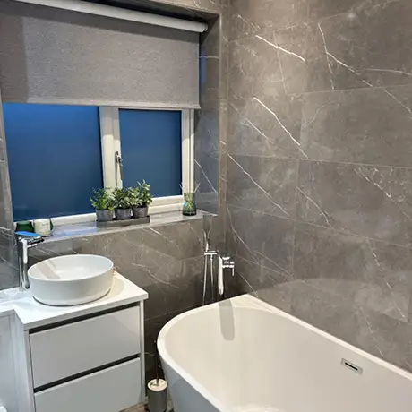 Grey marble tiles in modern bathroom