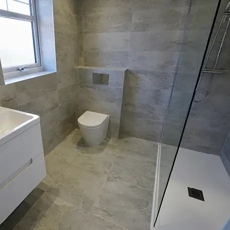 Grey bathroom floor and wall tiles