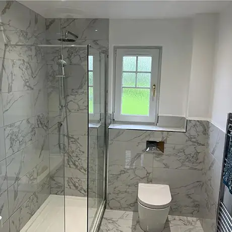 Bathroom and showerwall featuring Lassen Carrara