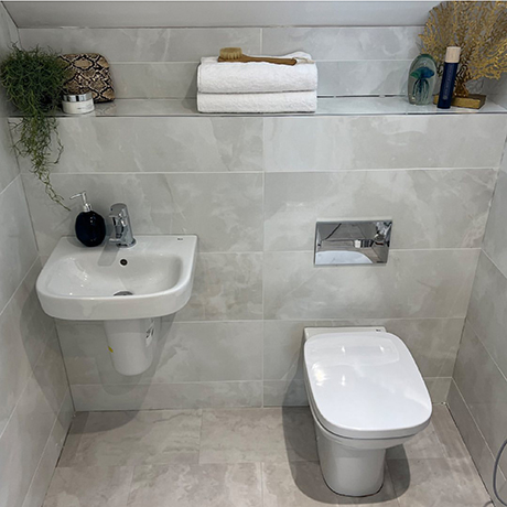 Small contemporary bathroom space tiled in Stoneware Flint