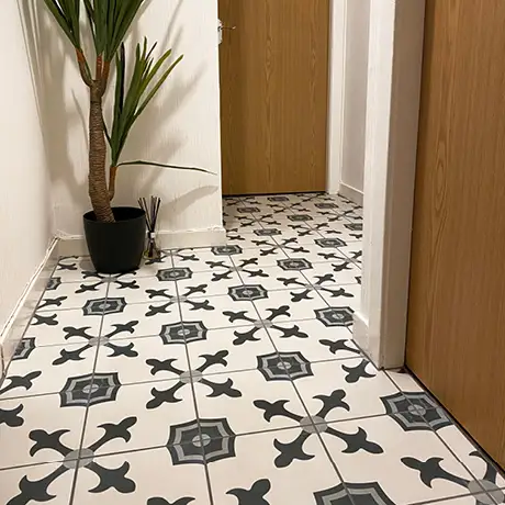 Patterned hallway using CTD havana white tiles
