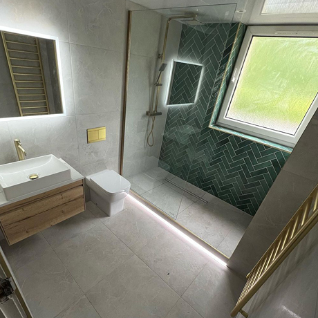 Grey and green bathroom shower tiles