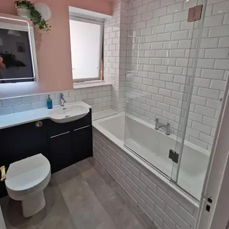 Bevelled patterned white bathroom wall tiles