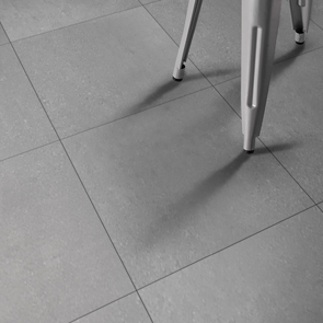 close up of the traffic light grey matt tile with free standing stool legs