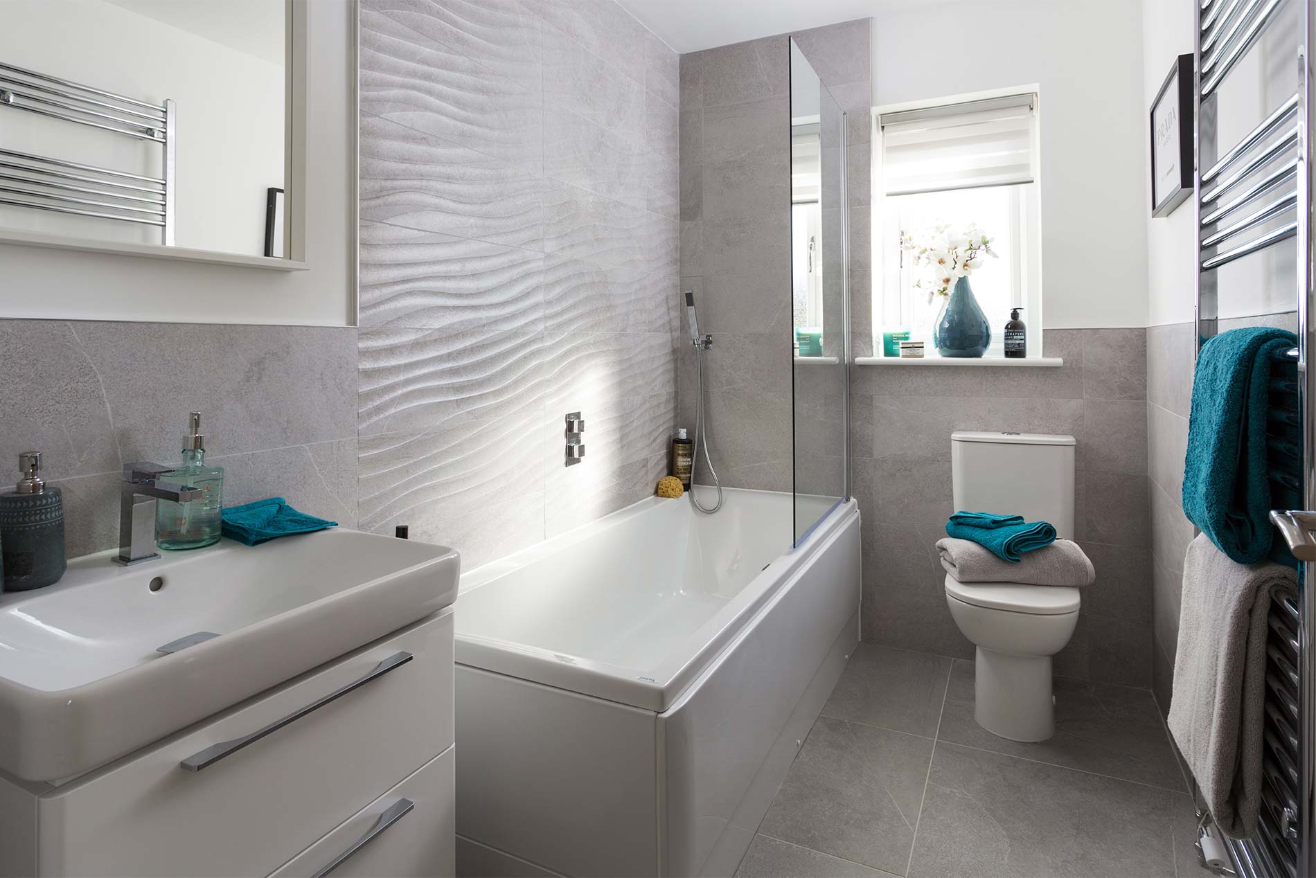 Rock Grey and Concept Grey wall and floor tiles in the bathroom of a new build home