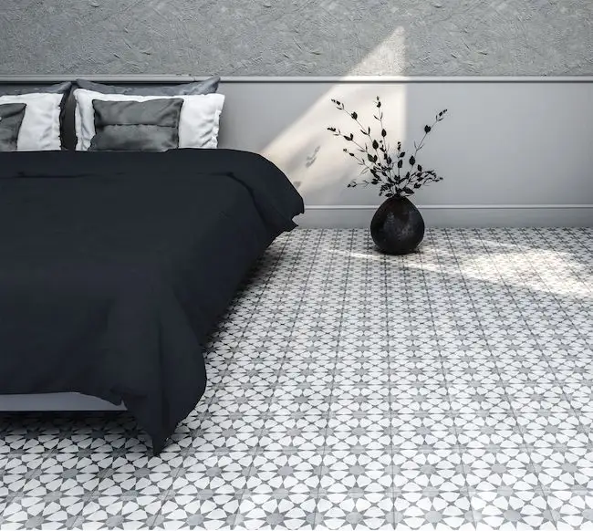 Pattern floor tiles on bedroom floor