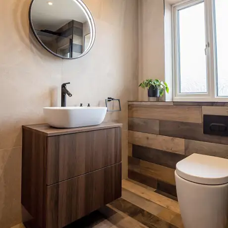 Bathroom floor and wall tiles dark wood and british stone