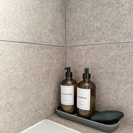 Grey tiles in bathroom setting