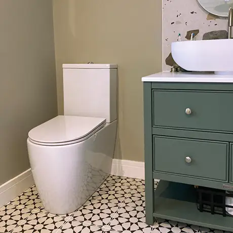 Black and white star tiles on bathroom floor