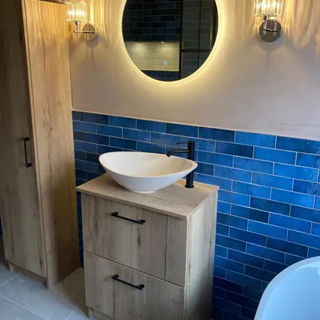 Half Blue Tiled Bathroom Wall with Natural Wood Décor