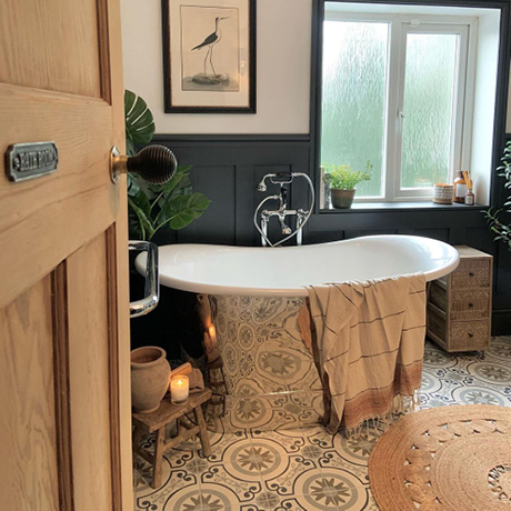 Characterful bathroom with patterned tiles on the floor