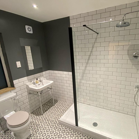 Traditonal White and grey Bathroom with brick tiles
