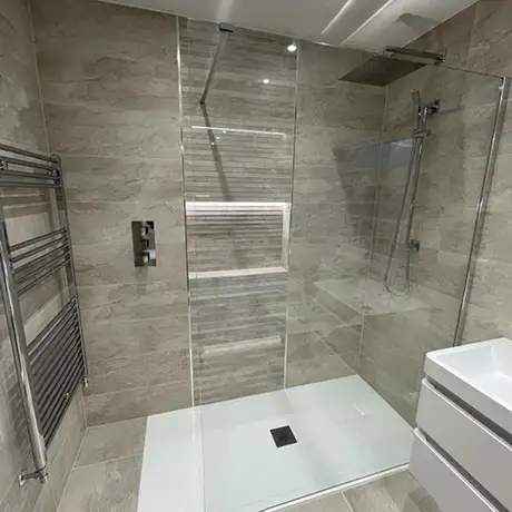 Walk-in shower floor and wall tiles