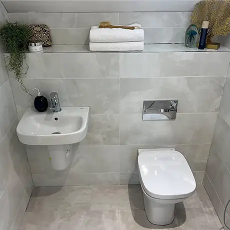 Small contemporary bathroom space tiled in Stoneware Flint