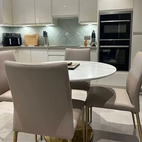 Light green tiles in kitchen setting