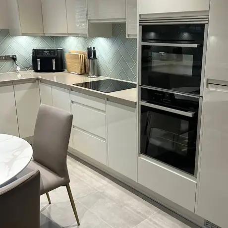Light green tiles in kitchen setting