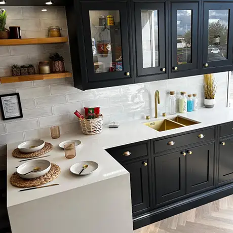 Glossy white grey brick tiles with a black and white kitchen