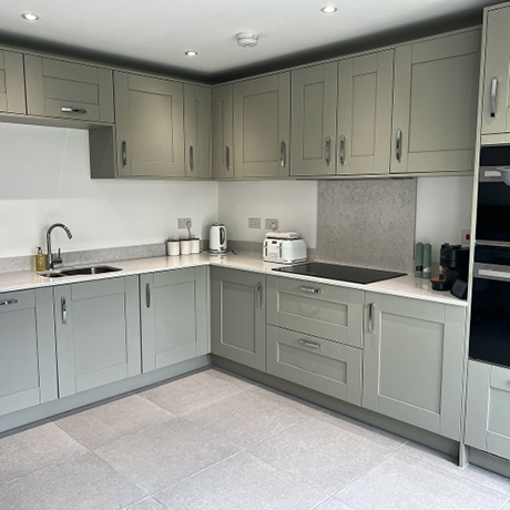 Light natural tiles in kitchen setting
