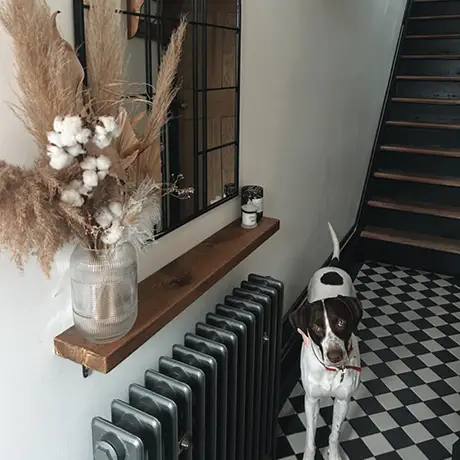 Black and white victorial checkered tiles in hallway