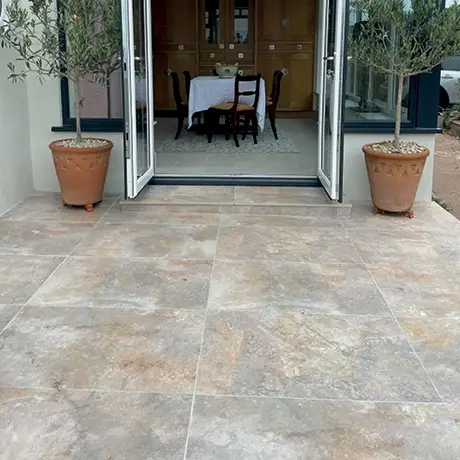 Back entrance to house featuring Burlington Ivory