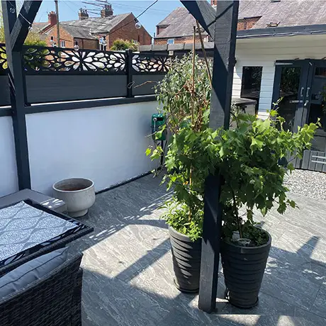 Stylish garden space tiled in Lavastone Anthracite