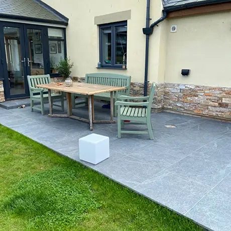 Anthracite grey tiled patio area