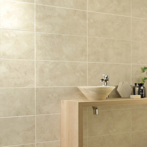 Cream matt tile features on wall of sink area in bathroom. 