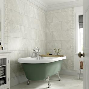 traditional styled bathroom with claw foot bath and open space