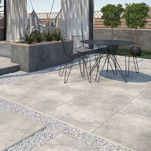 Burlington Silver outdoor 2cm porcelain tile on a external patio with contrasting black garden furniture