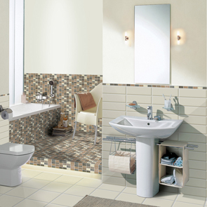 White tiles around the toilet and sink area of the bathroom, and mosaic style brown shades around the bath. 