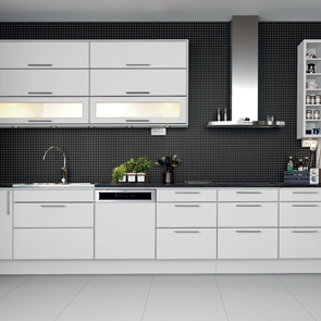 Gloss white floor tiles worked with moasic style black tile on the walls of modern kitchen.