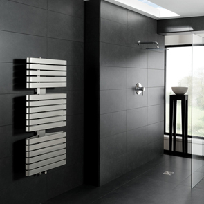 Earth 600x300 tile in a modern bathroom setting with wall mounted chrome towel radiator and walk in shower enclosure