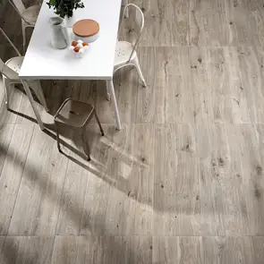 top down view of the treverkever ash tiles with matt white dining table
