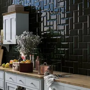 Bathroom black wall tiles splashback from the sink