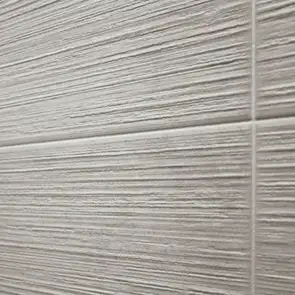 Close up of the texture of the timeless saw perla tile.