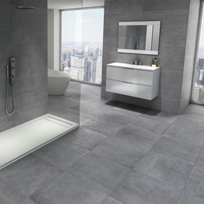 Modern bathroom setting with freestanding bath and walk in shower enclosure with the modern timeless gris tile