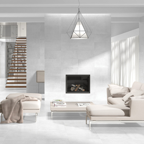 Open plan living room with built in log burner feature fully tiled in the timeless white range.