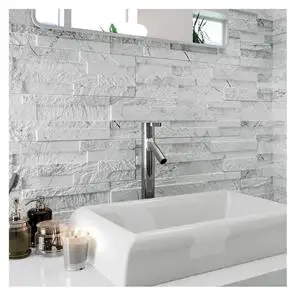 Gloss white ceramic sink infront of a fully tiled wall in the tiffany white range of porcelain slate effect tiles.