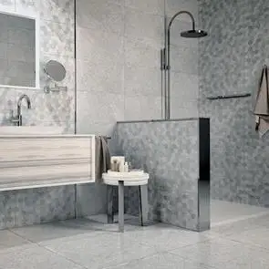 Buxy Gris ceramic wall tile being used on accenting walls with matching hexagon décor tile