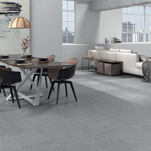 Buxy Gris porcelain floor tile in a modern kitchen and dining room,