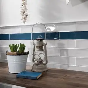 Poitiers White Gloss Tile shown behind sink in kicthen