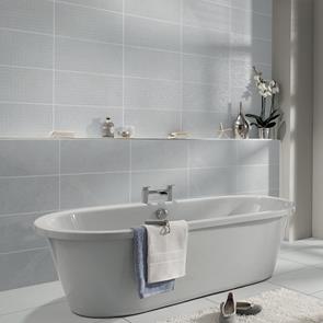 Cliveden grey ceramic wall tile being used as a feature behind a freestanding bath
