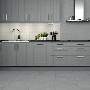 Kitchen floor featuring Cliveden grey floor tiles and coordinating wall tiles