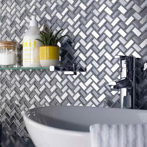 Close up of Dusk Grey Herringbone Glass & Mirror Mosaic on bathroom wall splashback