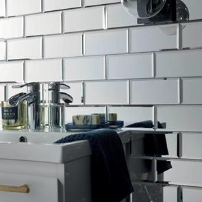 Close up of Lumiere Bevel Mirror Brick Mosaic on bathroom wall