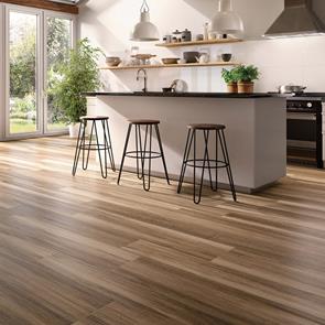 Moulden 2 greige tile in a open plan modern kitchen with black/brown stools and island