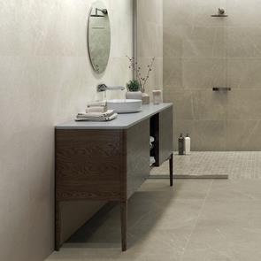 Inari crema tile in a open space with Dark oak furniture and wall mounted mirror and shower fittings