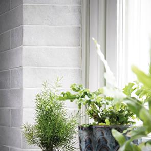 Dyroy white on a kitchen wall with contemporary furnishings