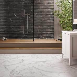 B&W Star White Gloss marble effect floor tile with contrasting black featrure tile in a Shower setting