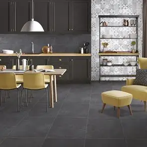 Cementine Anthracite tiles on contemporary kitchen wall with patchwork décor feature wall